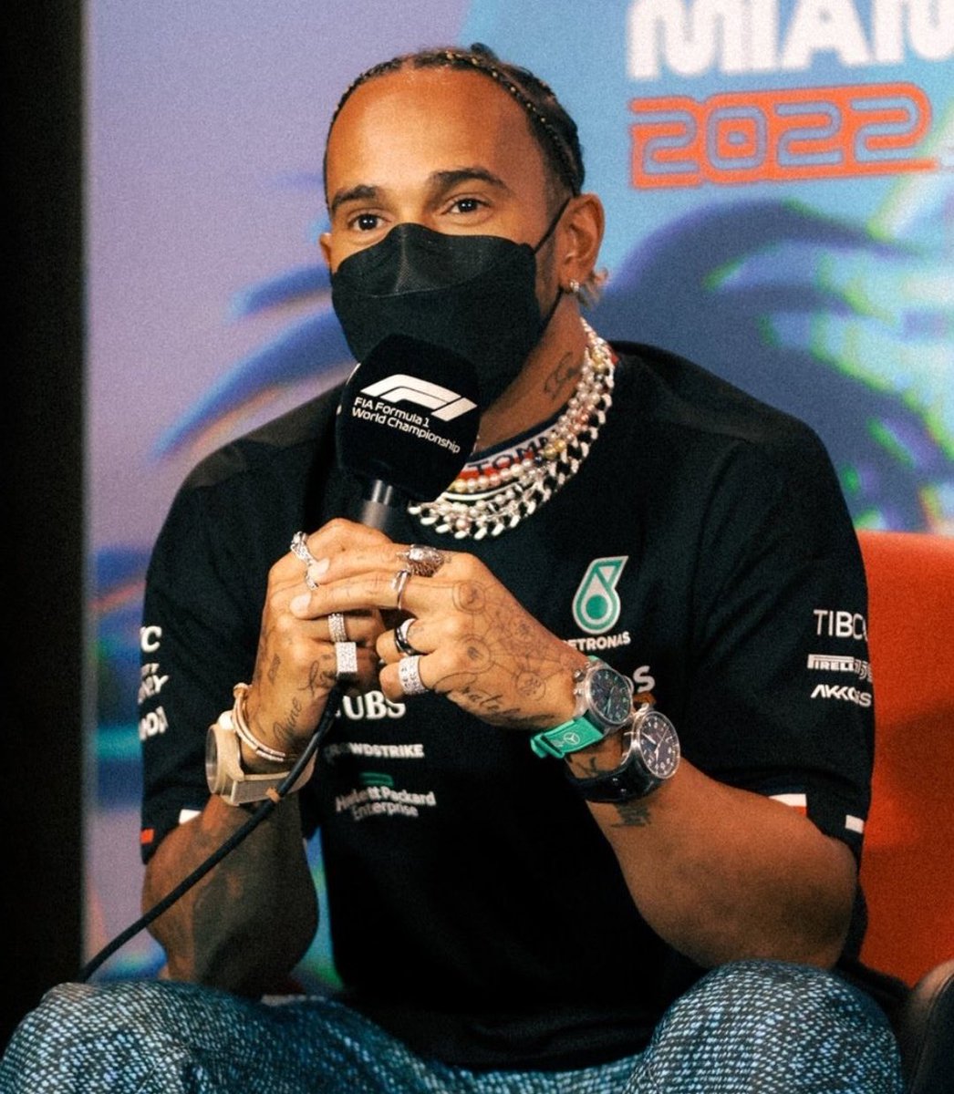 sedici44's tweet photo. lewis pulling up wearing 3 watches, 8 rings, 4 necklaces, 2 earrings and a bracelet during FIA jewellery gate https://t.co/khjbjhzOXf