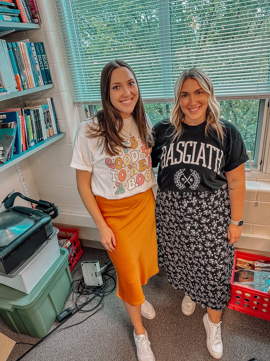 MsKMetzler's tweet photo. “She was sunshine ☀️ I was midnight rain 🌧️ ” on book shirt Wednesday! @MsFroats https://t.co/G24ZDAyAAV