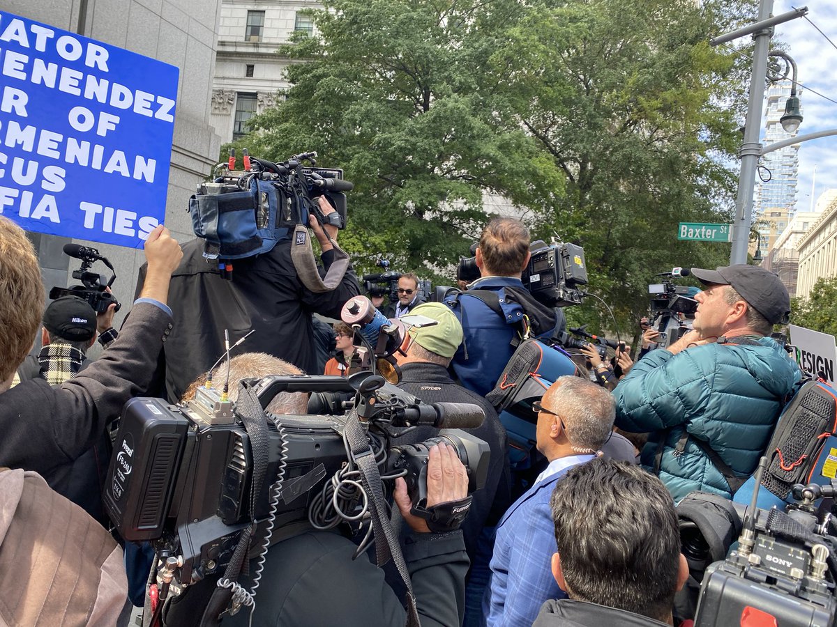 Waiting for Senator Menendez to leave federal court after he pleaded not guilty to bribery charges.