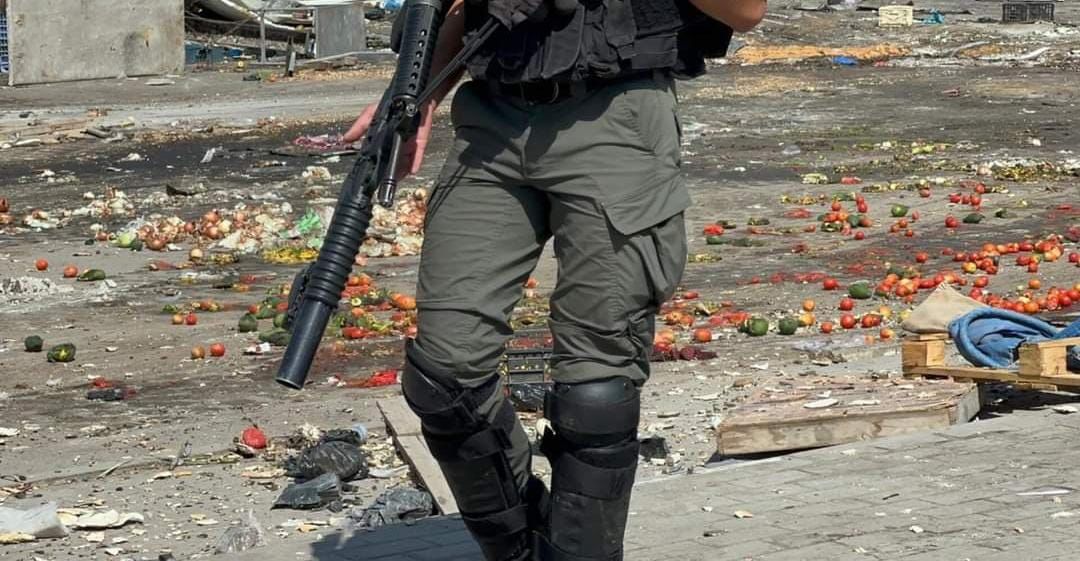 Israeli occupation forces demolish market stalls near Jalameh checkpoint in northeast Jenin this morning.