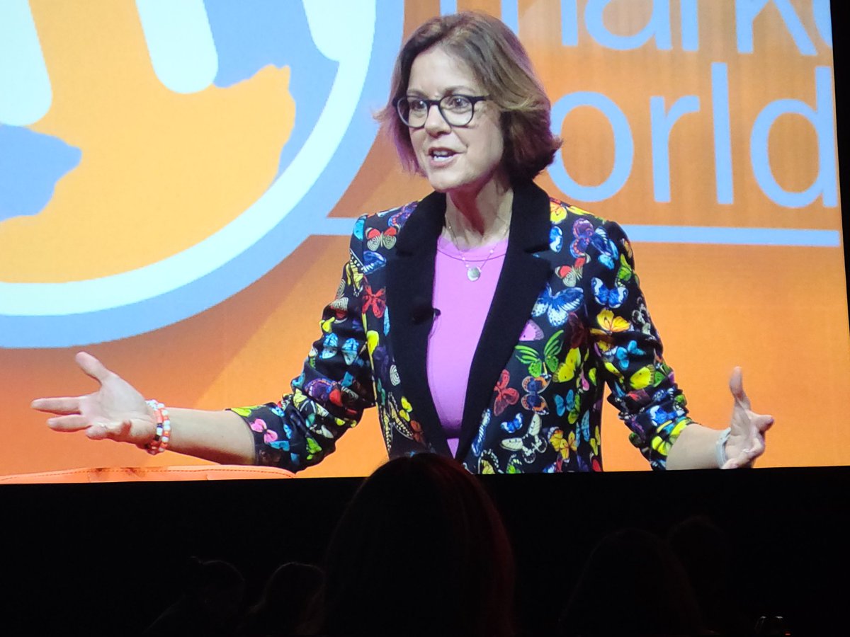 When <a href="/annhandley/">Ann Handley</a> is wearing your friendship bracelet on the #CMWorld keynote stage. 🧡🧡🧡