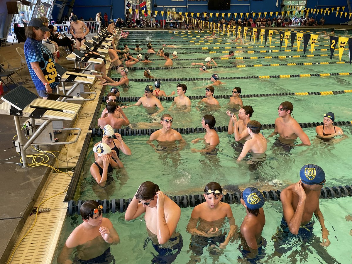 stjoeswim's tweet photo. The @StJoeMadison swimmers are in the pool for warm-ups at the @msais swim meet. Go Bruins! https://t.co/BhPS8E6dl2