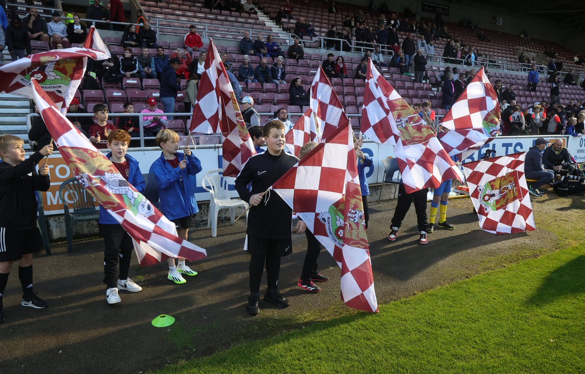 ntfc's tweet photo. 🤩 Thank you to our flag wavers yesterday. Please email tickets@ntfc.co.uk to arrange for your team, group or school to wave flags at a future game.

📸 @PeteNortonPhoto 

#ShoeArmy 👞 https://t.co/x479z8QxVh