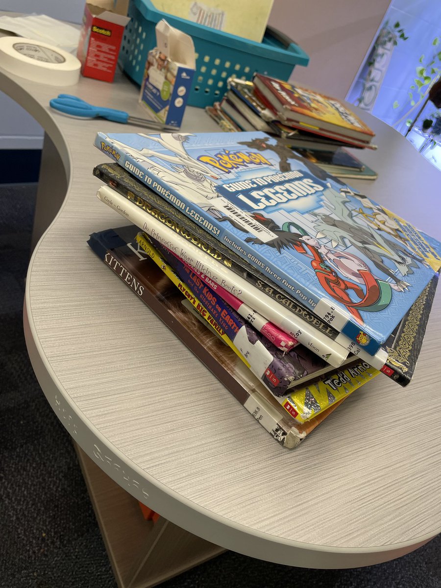 CenterDunbar's tweet photo. I have been collecting damaged books under my desk for just over a week and finally had a moment to use my new repair kit from @Hillsedufnd! #hubofschool https://t.co/Rngq1Z0Wat