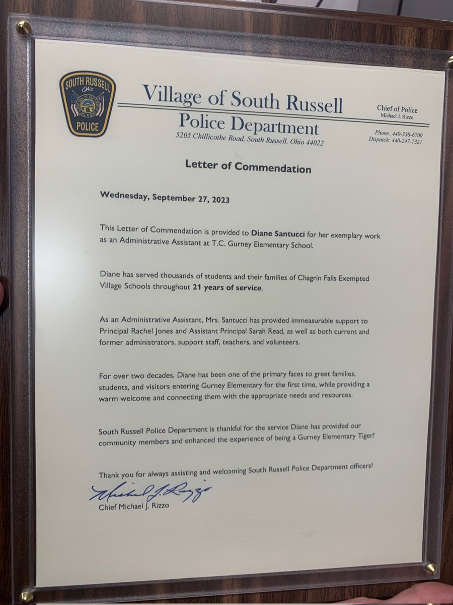 Mrs. Santucci, Admin Assistant, is leaving us after 21 years. South Russell PD stopped by to give her a formal letter of commendation and a beautiful gift basket! A loss to our school AND community - we will miss her! #CFTogether