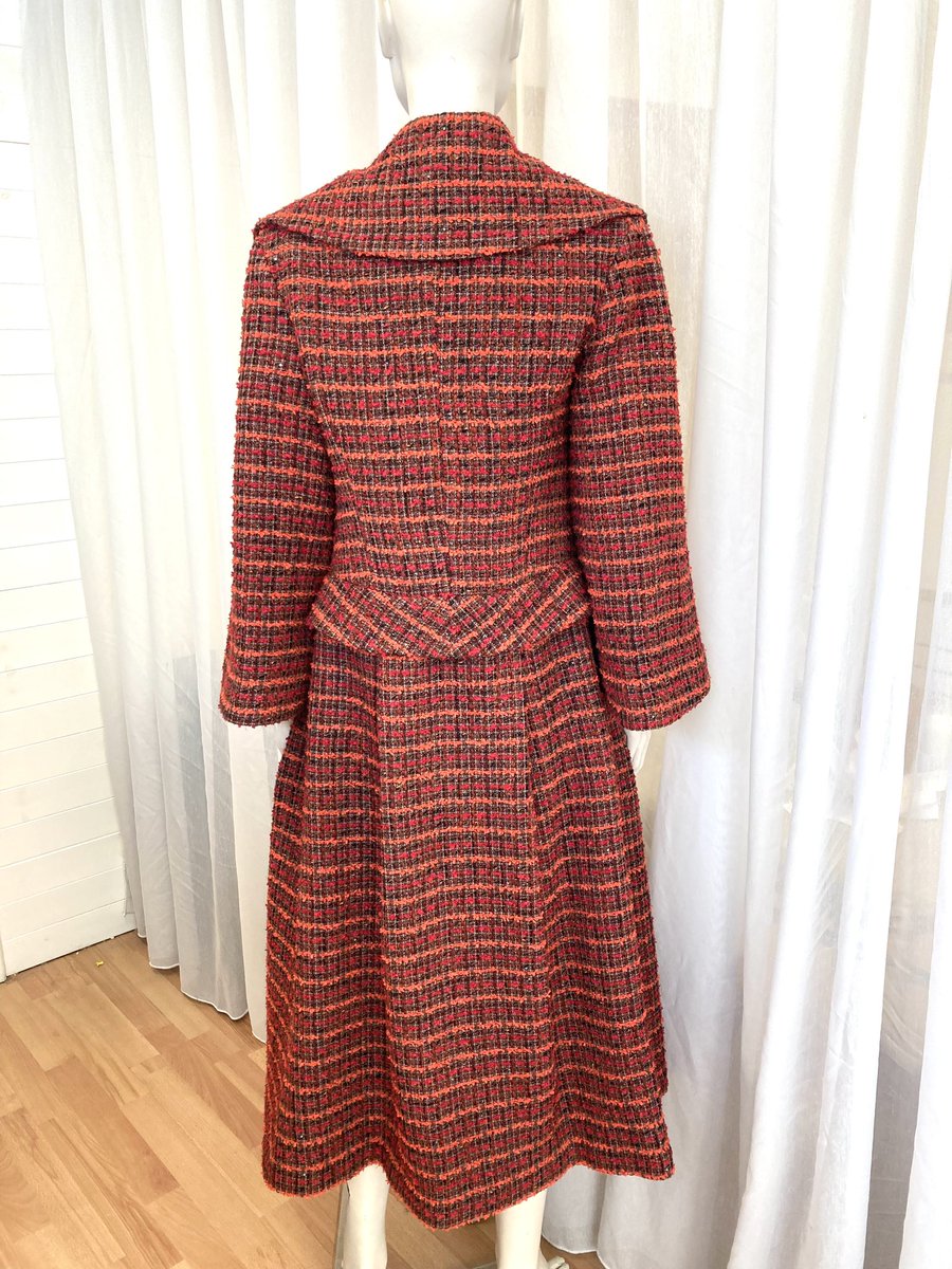 NiallTyrrell's tweet photo. A very happy customer recently picked up her custom made woven tweed coat just in time for #StormAgnes .We love the autumnal colours of the hand woven tweed.#madetoorder #madeinirelad #irishdesigner #couture https://t.co/g61Tjs51II