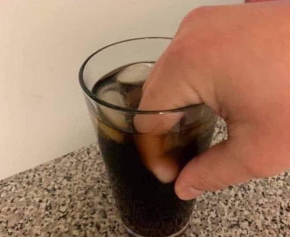 ayeejuju's tweet photo. never trust a mf who holds a drink like this https://t.co/32c9ugbRXm