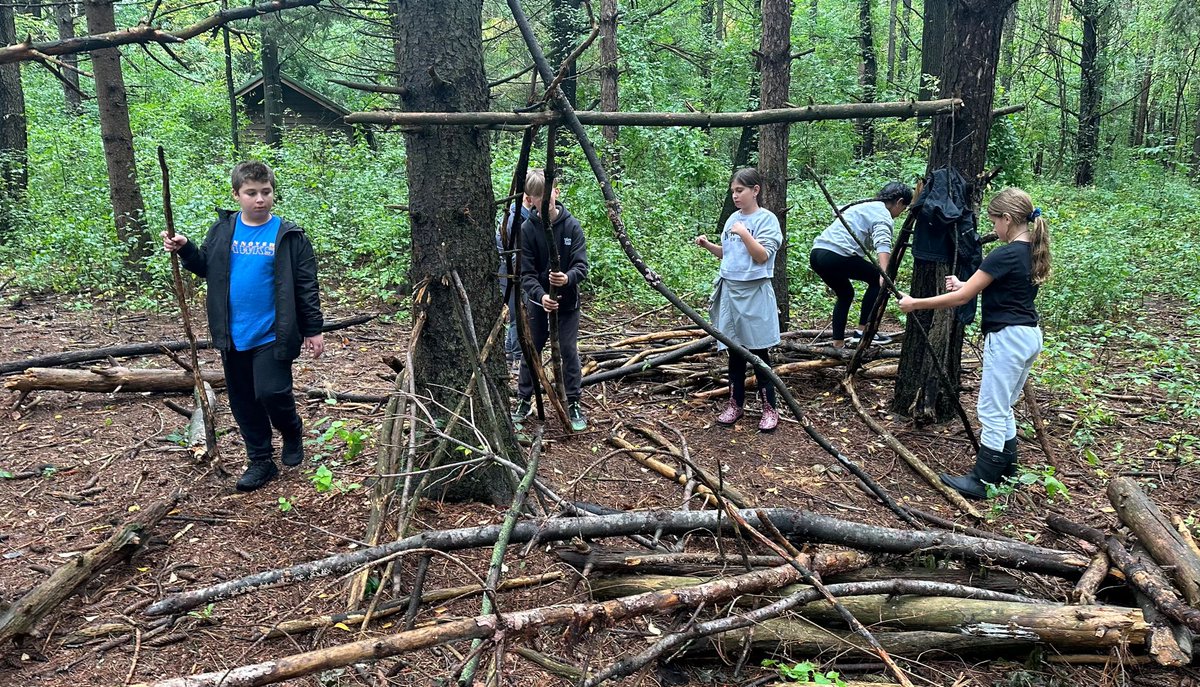 PennoyerSchool's tweet photo. Our fifth graders are having a great time building shelters at Camp Edwards! These campers are going to be tired tonight… 💪🏼 🏕️🥱  #teamwork #pennoyerpride #campedwards https://t.co/XdnkUA3fz0