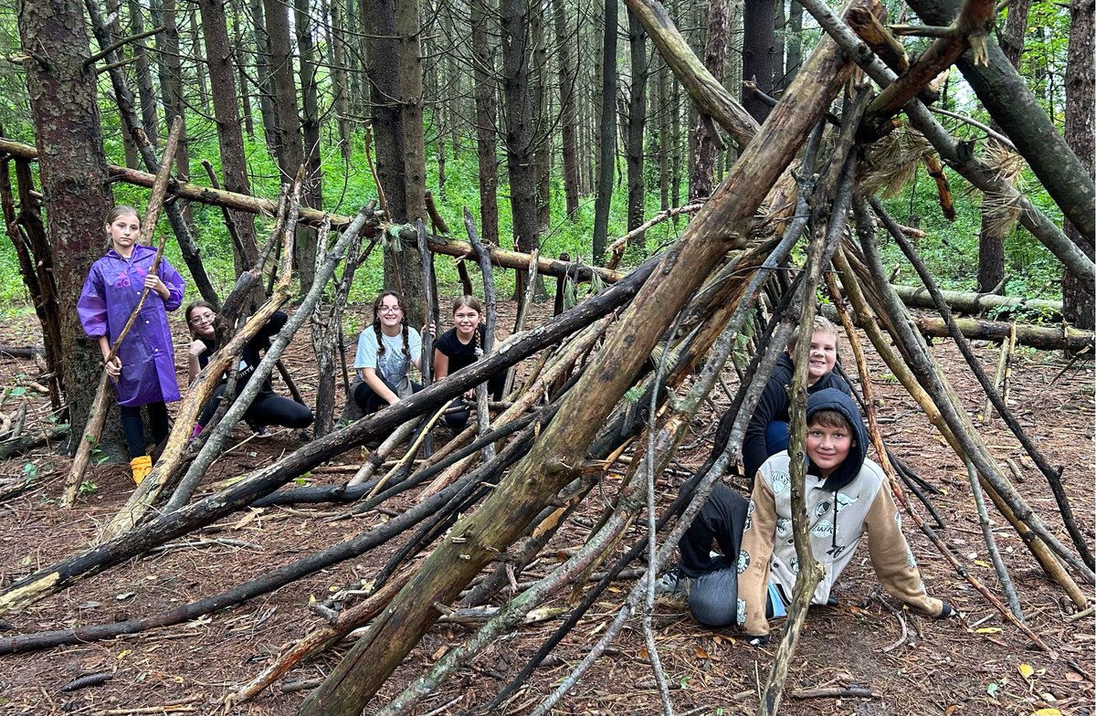 PennoyerSchool's tweet photo. Our fifth graders are having a great time building shelters at Camp Edwards! These campers are going to be tired tonight… 💪🏼 🏕️🥱  #teamwork #pennoyerpride #campedwards https://t.co/XdnkUA3fz0