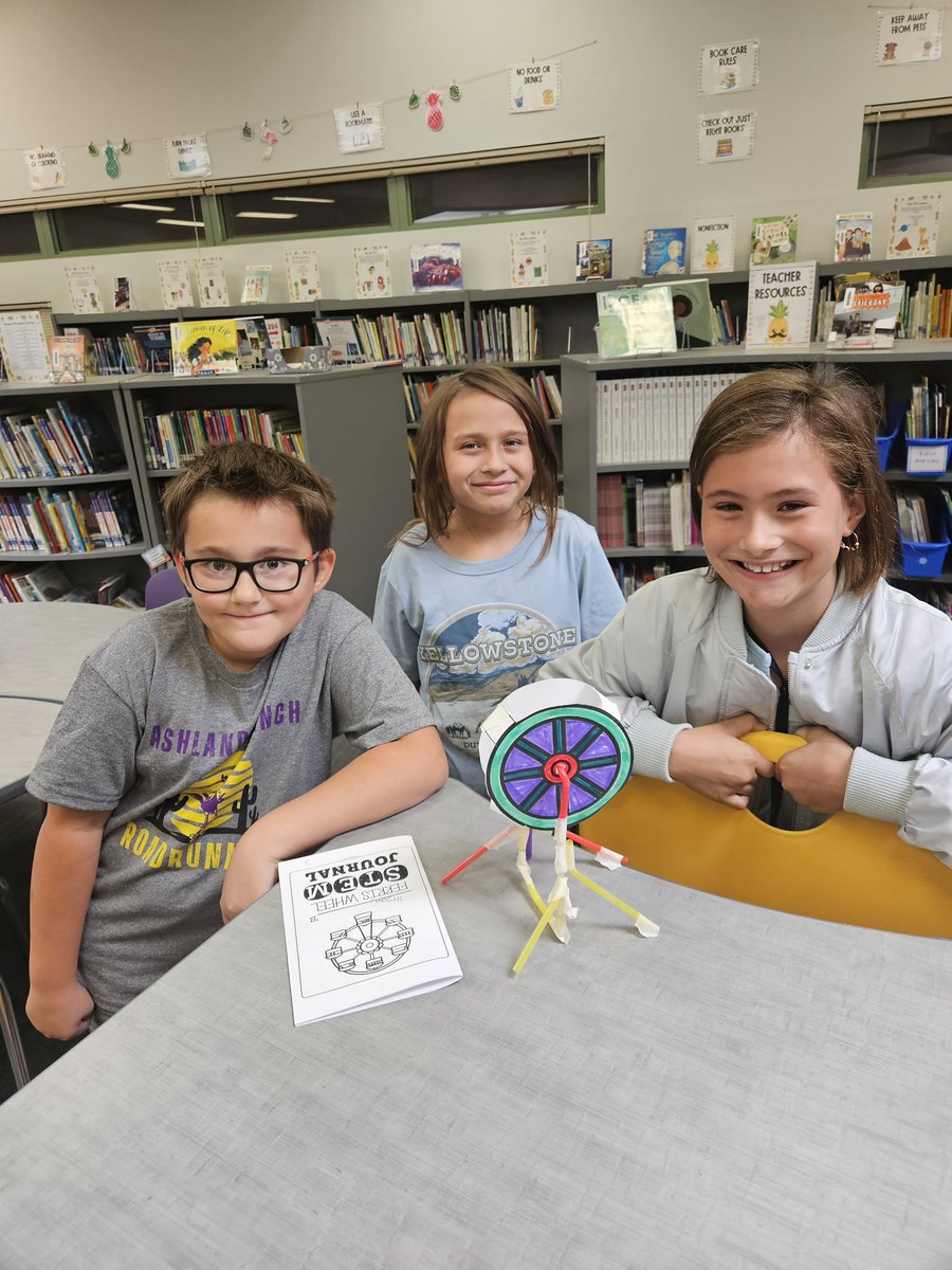 Ashland_Ranch's tweet photo. Last week in library, 4th graders learned about the history of the Ferris Wheel and read "Mr Ferris and His Wheel". This week, students used the design and engineer process to collaboratively create a ferris wheel that spins around an axle and can stand on it's own. @carlyandadam https://t.co/OVKbCRqPyZ