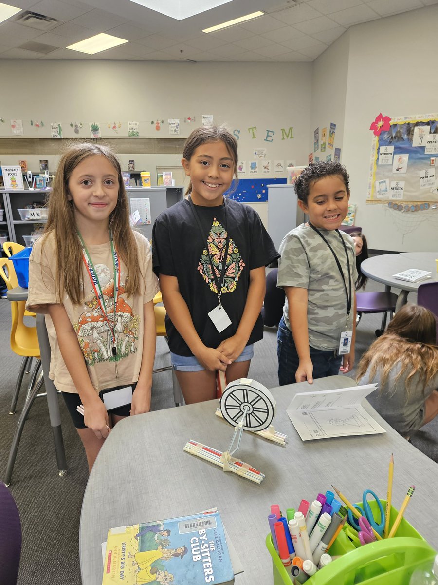 Ashland_Ranch's tweet photo. Last week in library, 4th graders learned about the history of the Ferris Wheel and read "Mr Ferris and His Wheel". This week, students used the design and engineer process to collaboratively create a ferris wheel that spins around an axle and can stand on it's own. @carlyandadam https://t.co/OVKbCRqPyZ