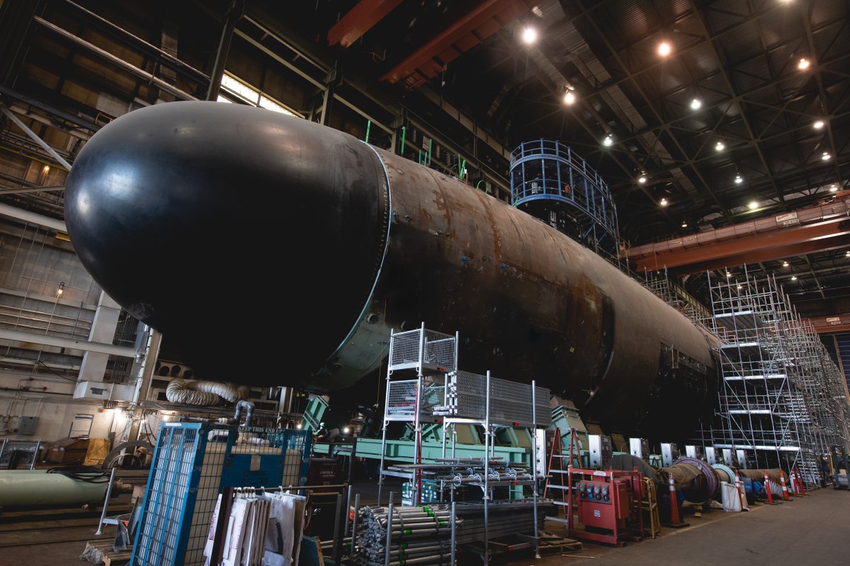 WeAreHII's tweet photo. Shipbuilders at our #NewportNewsShipbuilding division recently accomplished a significant construction milestone on Arkansas (#SSN800). The 27th @USNavy Virginia-class #submarine is now pressure hull complete. Read more here: https://t.co/1s45y6oyPu https://t.co/Z27MaXAeX5