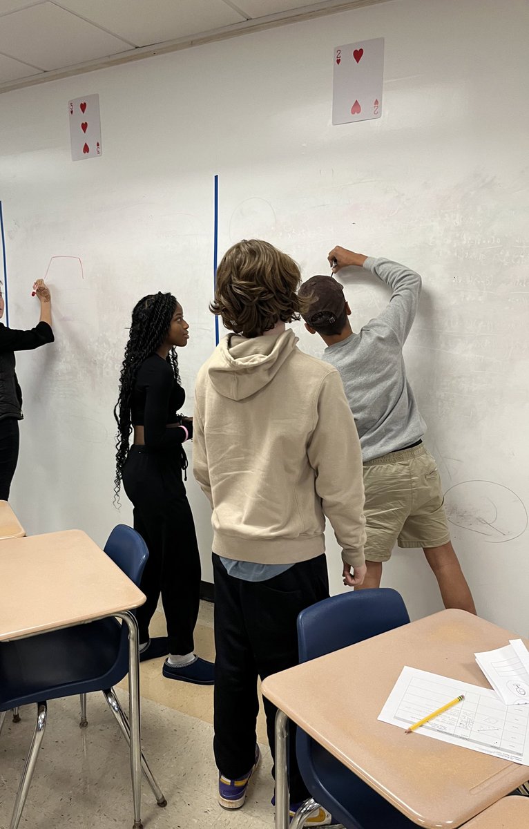 JessicaLeitman's tweet photo. SO much happening here!  #Team202 is showing off their solving equations skills with partners! Love the teamwork 🧡💙#WeAreChappaqua #Iteachmath @MrInhaber @ski626 @Lauren_Olmo @jsullivan165 @PlateKaitlyn @Greeley_Math https://t.co/SfIElV9nWb