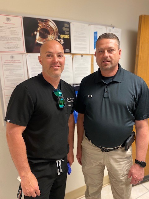 USMSFortSmith's tweet photo. Today, we partnered with @BaptistHealthFS and @SullyEMdoc Doctor Sullivan, a sworn Task Force Officer within our district, to provide free flu shots to USMS, Task Force and US Court staff.  We hope to expand our efforts next year!  Pictured are Doctor Sullivan and (A) USM Allen. https://t.co/sFLeiLZD0m