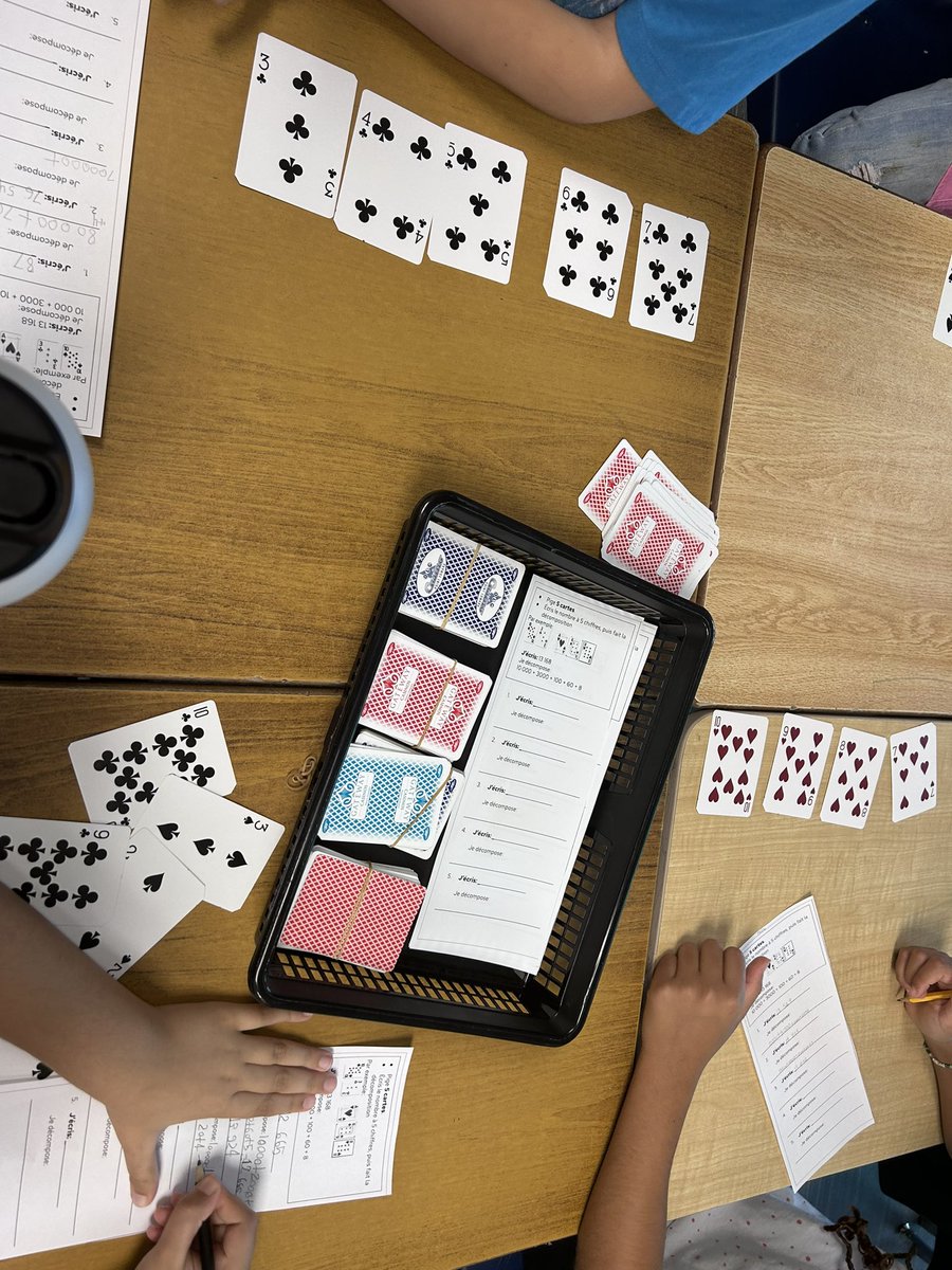 laclassedemmes's tweet photo. 133 is hard at work finding different ways to represent 5-digit numbers. Meeting with Madame was extra fun because we got to write on the table 😎#mathcentres #grade4 #grade5 @PEPanthersLND @TVDSBmath https://t.co/Bey1GgkcwO