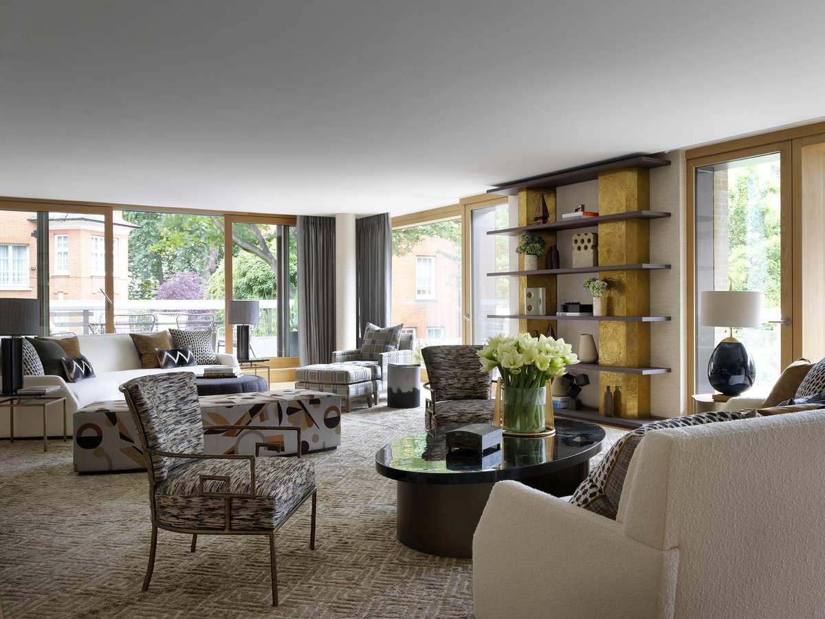 nataliamiyar's tweet photo. The asymmetrical columns with a liquefied bronze-gold finish and textured timber shelfs create a one-of-a-kind piece for a London apartment. A collection of artisanal ceramics in neutral tones, made by British crafters, is an effective contrast. https://t.co/Ax4MzWBbTA