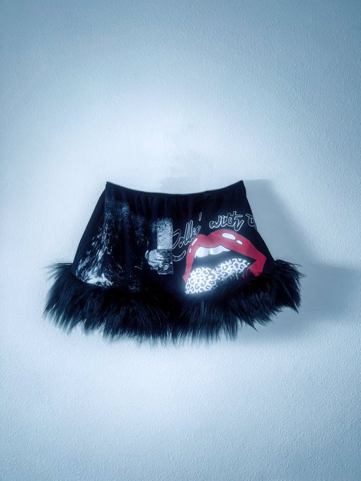 Made this jacket and skirt from different t-shirts. Added fur and rhinestones for the finished details