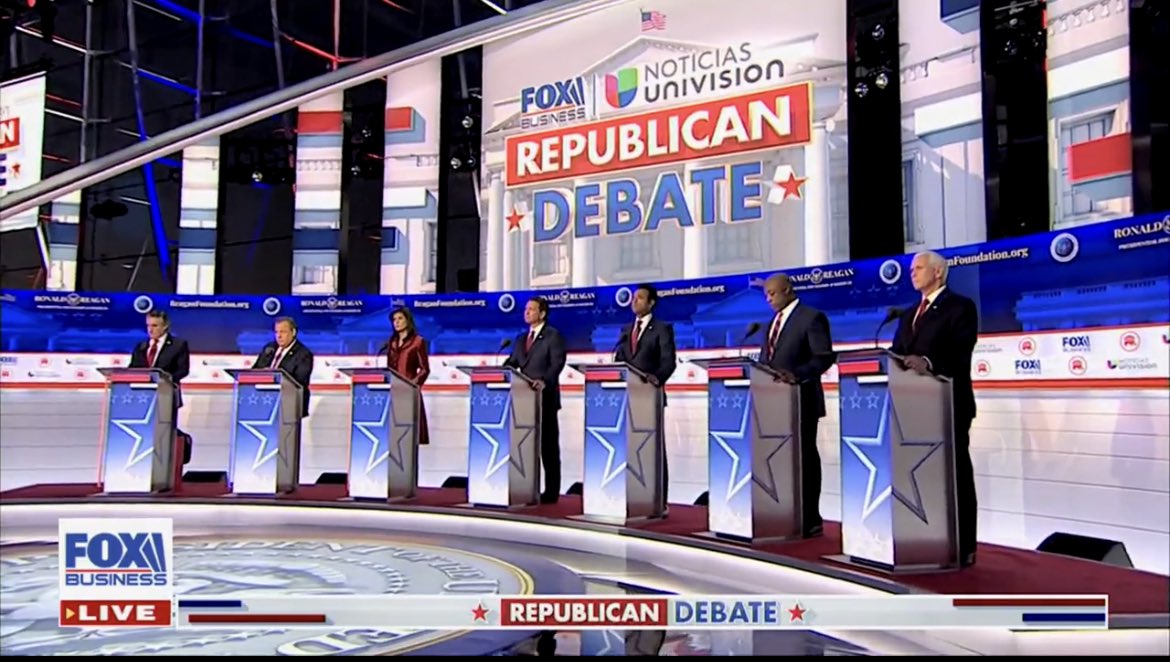 PastorMark's tweet photo. Republicans, there’s only one Savior, and he isn’t in this photo. #GOPDebate https://t.co/1eaeae8qFC
