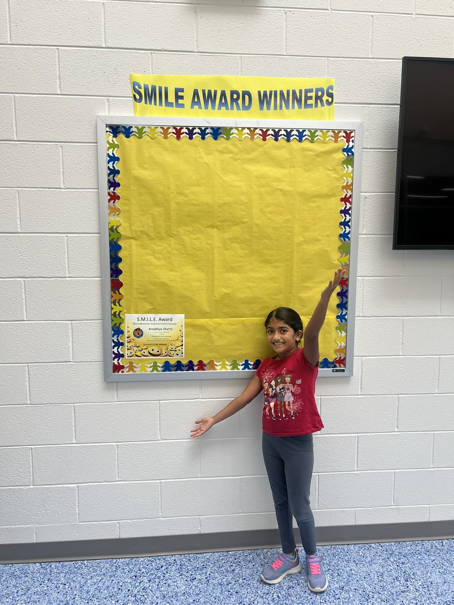 Feeling excited to have our first SMILE Award recipient hung up on the wall in the front of our school! Way to go Aradhya 👏🏼 <a href="/McNairUpperES/">McNair Upper ES</a>