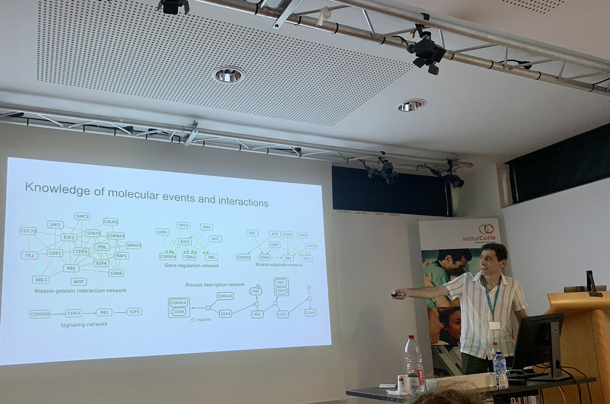 SysBioCurie's tweet photo. #SysBioCurie23 talk of the afternoon by @ozgunbabur from @UMass who introduces us to learn from multi omics measurements using prior knowledge. https://t.co/ahFLwKJeO3