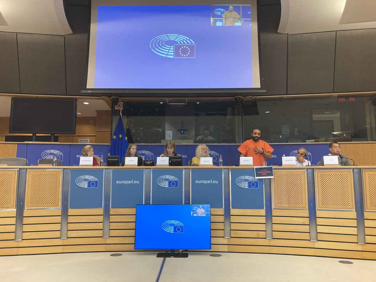 Really a striking sight at @Europarl_EN this morning, with testimony from three former Guantanamo prisoners, including @MansoorAdayfi in his orange jumpsuit: