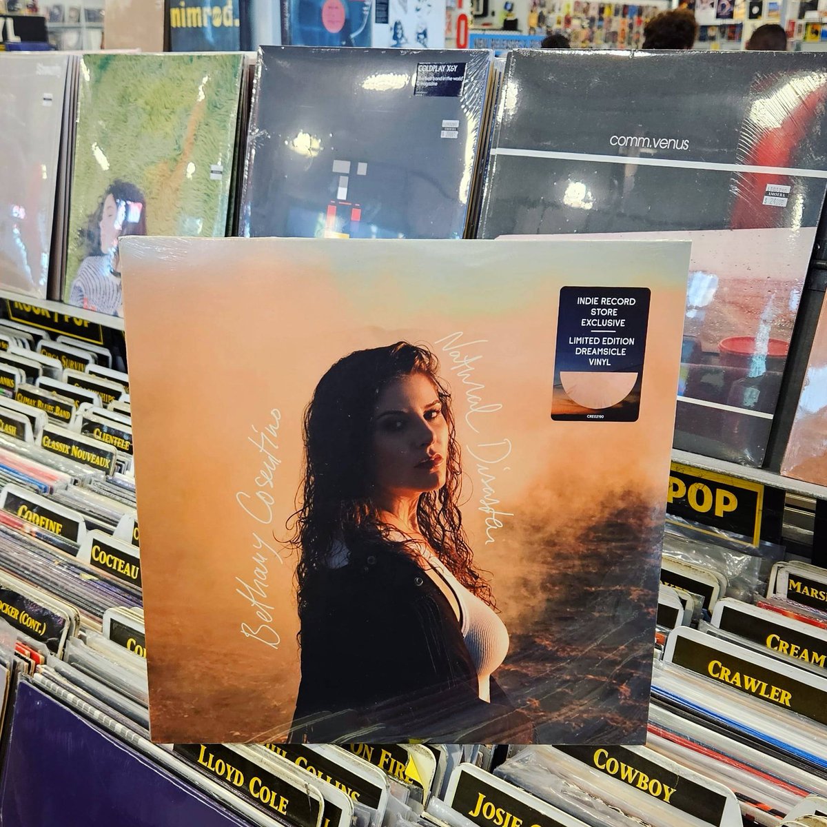 On her debut solo album, @BethanyCoast weaves together heartbreak and uncertainty over yearning guitars, tender choruses & sunshiney melodies. 'Natural Disaster' is out via @ConcordRecords on CD, LP, and indie exclusive dreamsicle vinyl. Get it here: bit.ly/3Na3Wvx