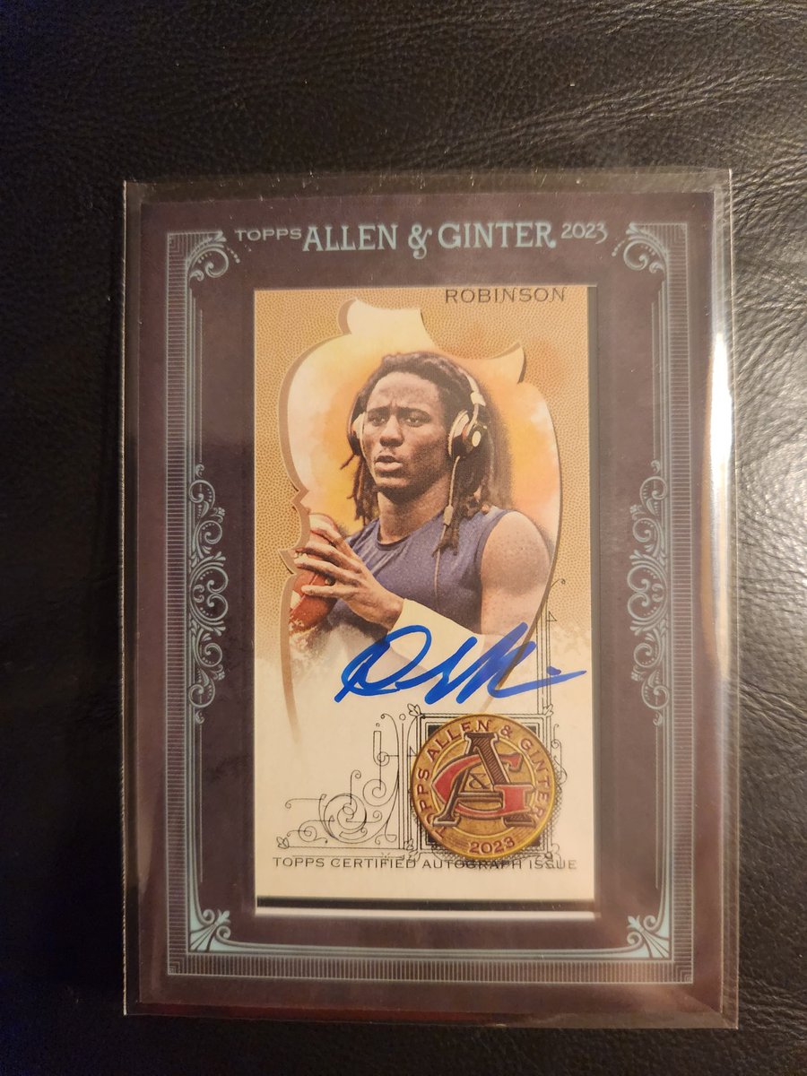 cmac_2214's tweet photo. Nice hit out of the Allen and Ginter! Denard Robinson mini black auto 4/25 
#topps #MichiganFootball https://t.co/wxLLUZqEVk