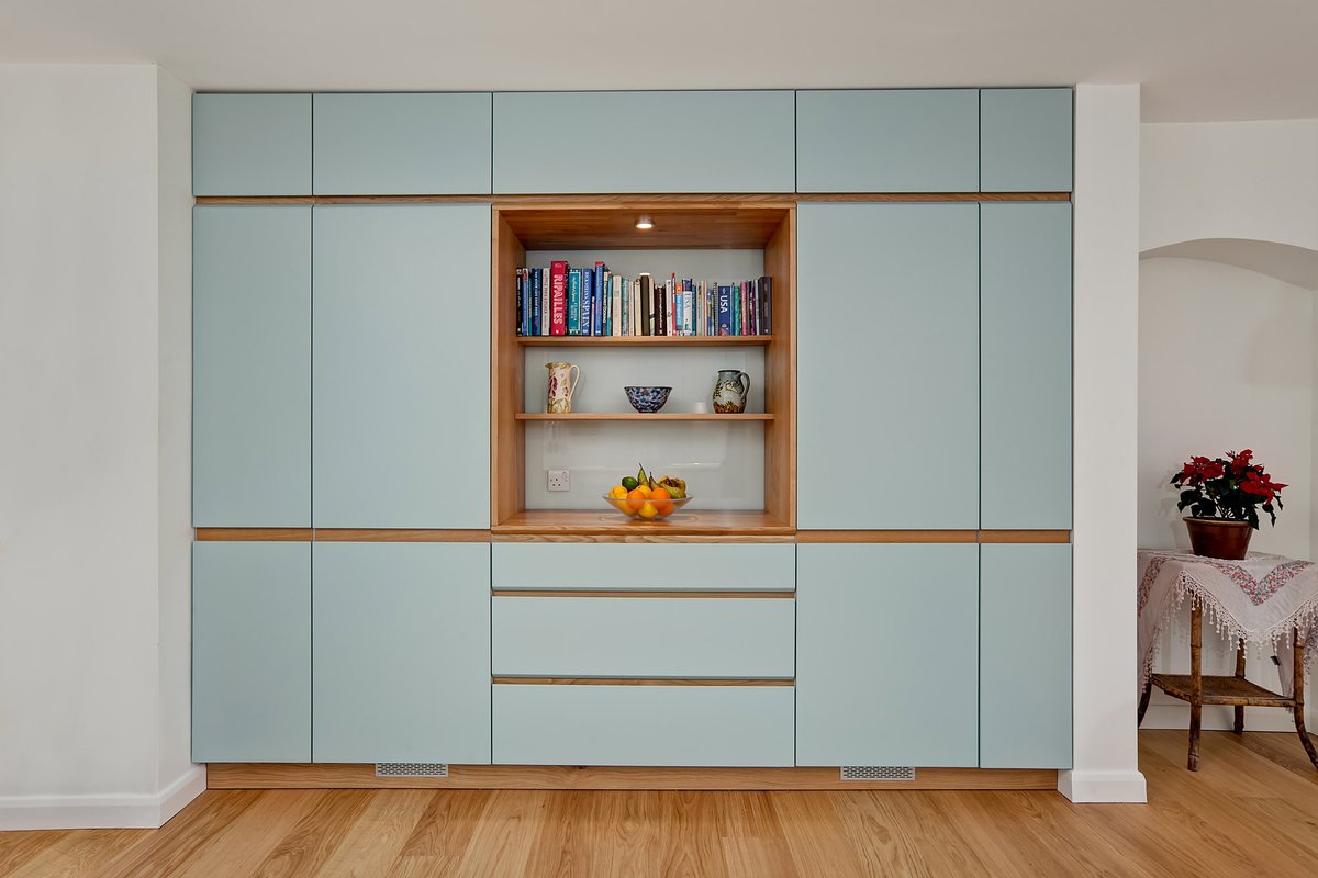 The overCASE is an excellent storage option that links the kitchen and living space beautifully. #builtinstorage #kitchenstorage #bespokestorage