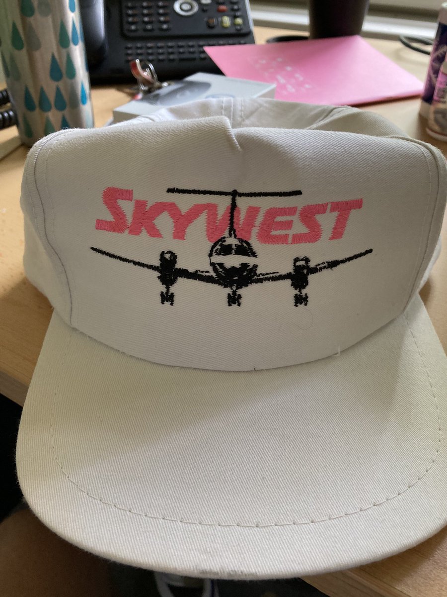Found this amazing cap in a box of like 300 from my grandpa. Wearing it everywhere now. The only thing that you could do to make my flights home to MT better <a href="/SkyWestAirlines/">SkyWest Airlines</a> would be to bring back the hot pink logo… 😏