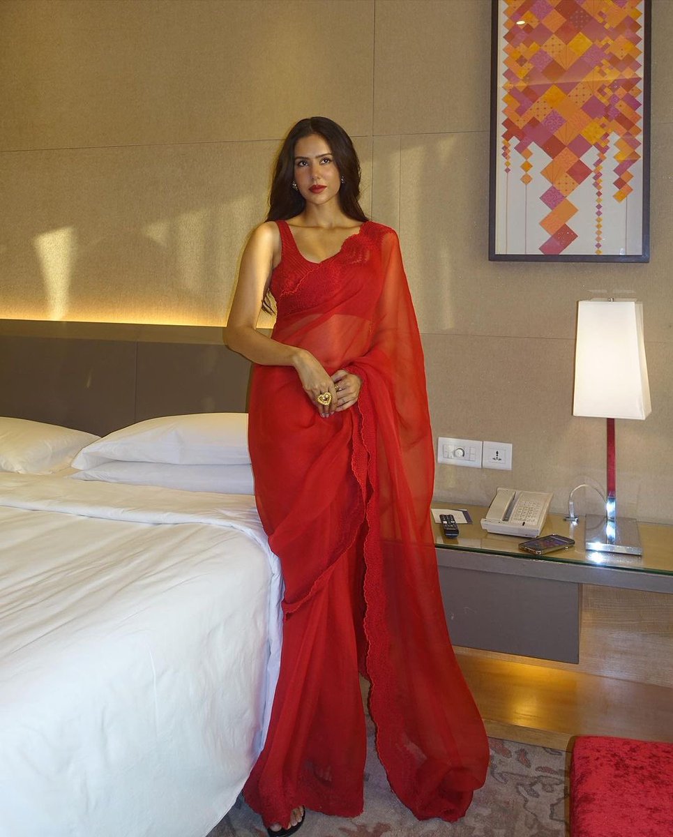 #SonamBajwa is setting the screens on fire in a steamy red saree 🔥