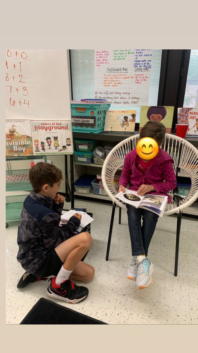 step_into_2nd's tweet photo. Put us in coach, we’re ready to read! 2G has been working hard on Fluency Partnerships. We understand the importance of working together to help each other achieve our reading goals! 🧡📖 https://t.co/NVfZ4Q7nU8