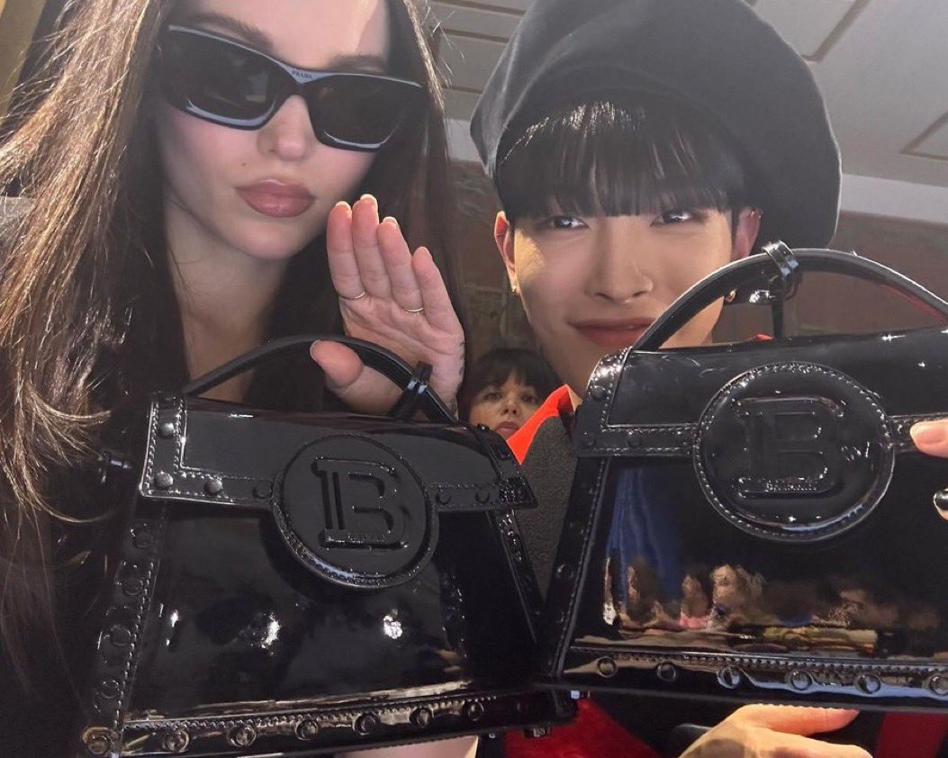PopBase's tweet image. Dove Cameron and Ateez’s Hongjoong at the Balmain fashion show.