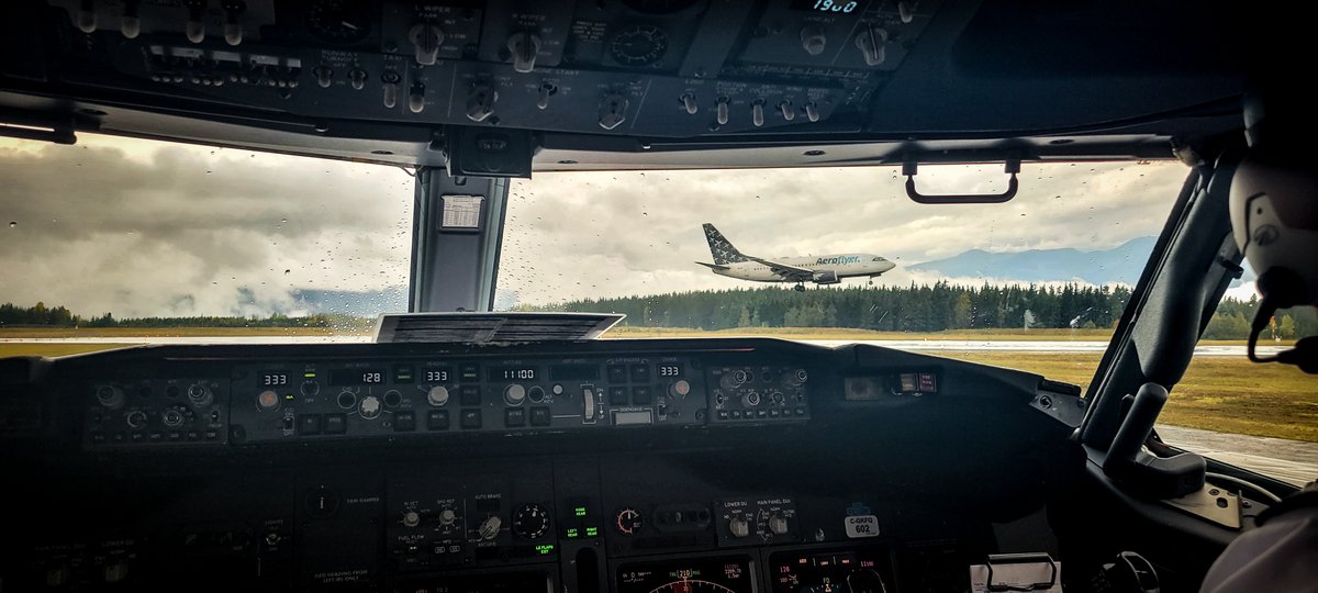 kfaeroflyer's tweet photo. Best seats in the house 🙌 We spy Aeroflyer 601 coming in for landing at YXT #Terrace from the flight deck of Aeroflyer 602!

#KFAeroflyer #PassengerCharter #B737 https://t.co/AWfTIOkhQV