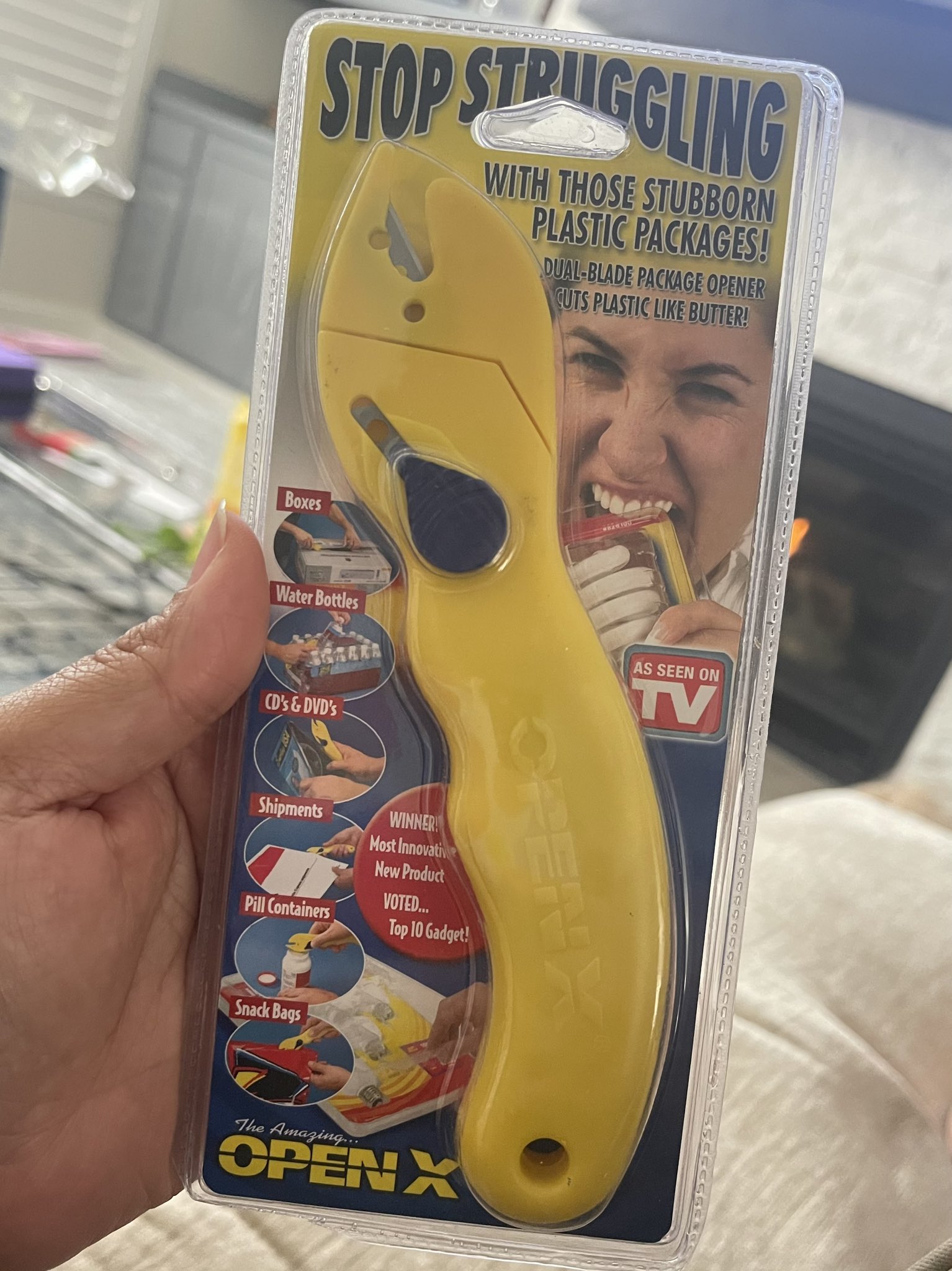 A stubborn plastic package opener wrapped in just that. : r/CrappyDesign