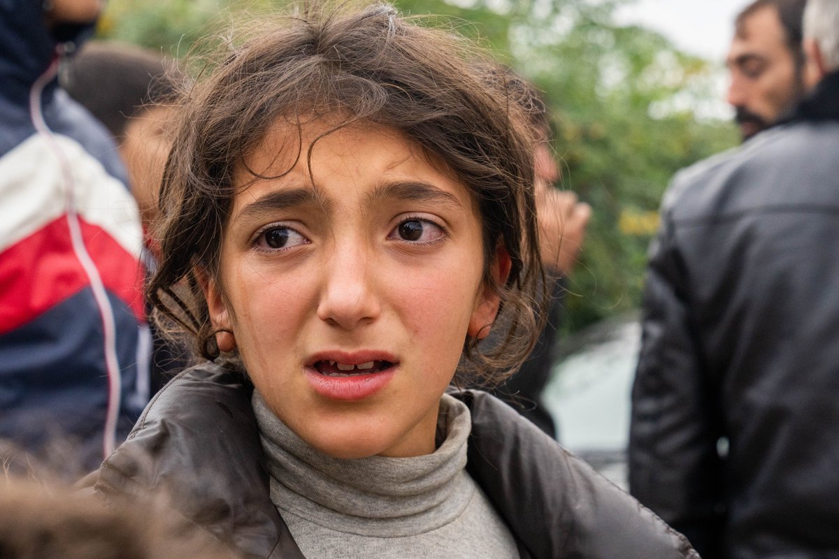 Free_Yezidi's tweet photo. FYF board member, photographer @AlexanderLouri4 , is at the border crossing with #Armenian civilians fleeing to safety.  Once again, in the 21st century, minority population pushed off of their land with no consequences for the perpetrators. Yezidis stand with #Armenie civilians. https://t.co/TeFhuTASC7