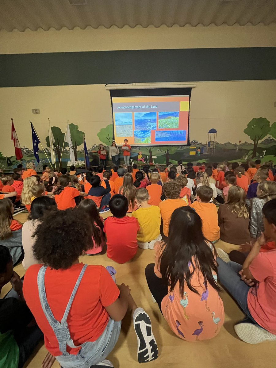 SASCBE's tweet image. Scenic Acres students and staff take time to honour Orange Shirt Day collectively. Thank you grade 5 students and Mr. Clovis for their leadership for coordinating the assembly. #OrangeShirtDay #TruthAndReconciliation @DClovis @yyCBEdu