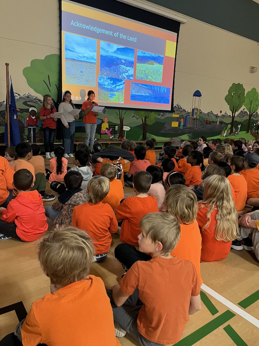 SASCBE's tweet image. Scenic Acres students and staff take time to honour Orange Shirt Day collectively. Thank you grade 5 students and Mr. Clovis for their leadership for coordinating the assembly. #OrangeShirtDay #TruthAndReconciliation @DClovis @yyCBEdu