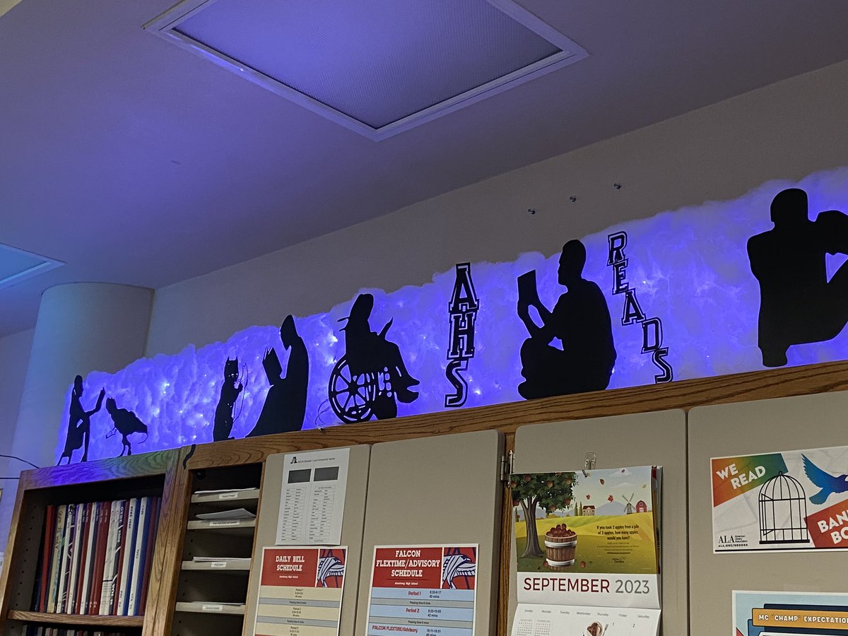 Have you seen the cool new AHS Reads backdrop behind the Media Center front counter? #ahsmedia #ledlights