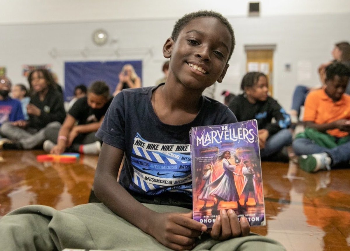 engross's tweet image. Our 4th and 5th grade @Chimborazo_ES students loved our special visit from best selling author Dhonielle Clayton,Tuesday. The best part of this Chimbo Jaguar’s pic that you can’t see is the stack of 7 other books he brought with him from the library that he wanted to read. 🥹