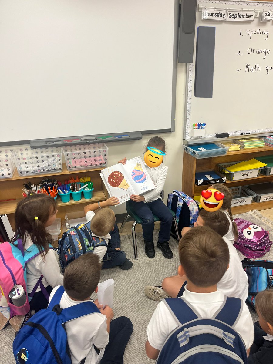 Practicing our FLSZ rule spelling and listening to a read aloud by our star student of the week!