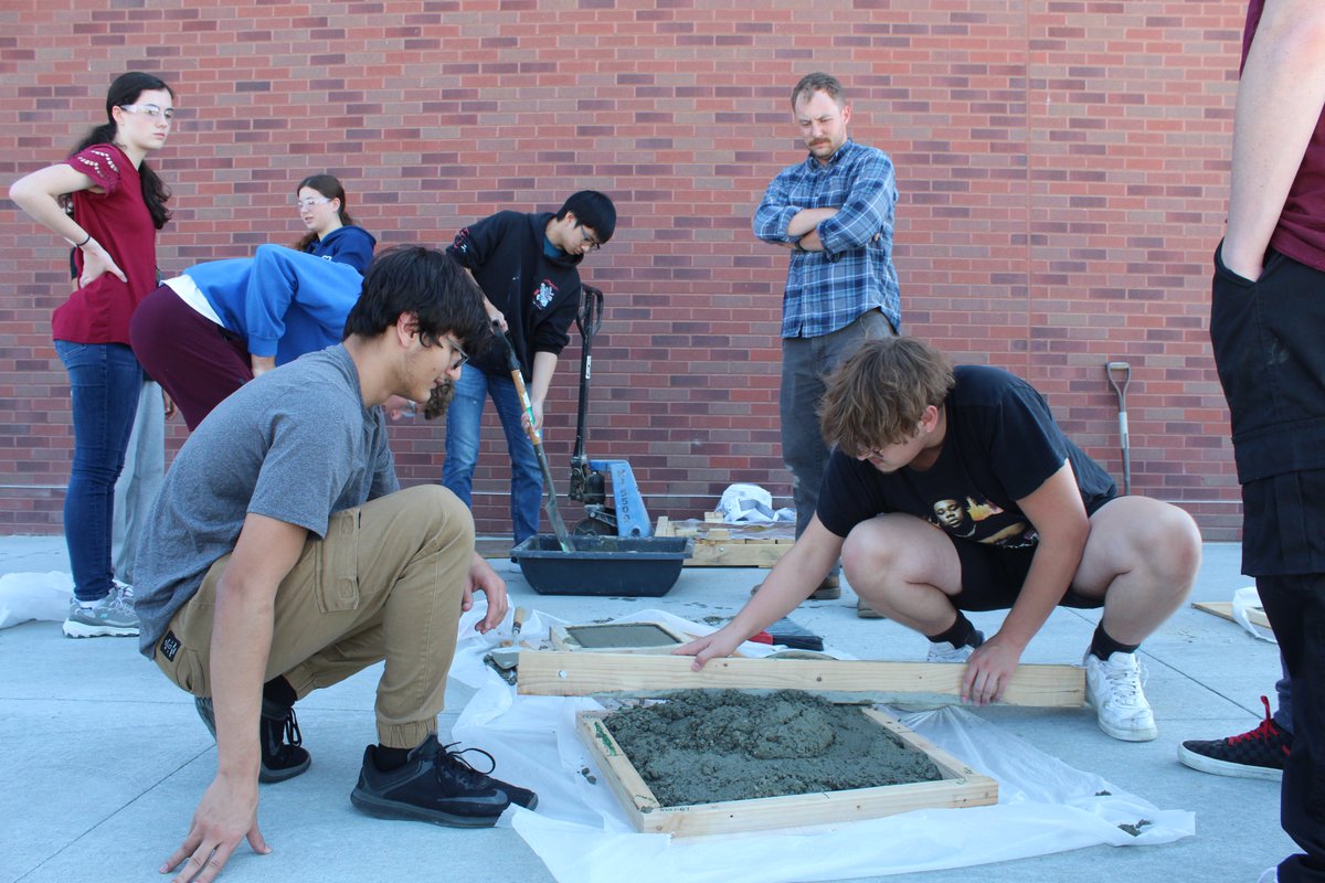 SchoolsPlc's tweet image. Students in Mr. Horak's Construction class @plpulse  learned how to mix and set concrete today! And yes, once they demonstrated  appropriate skill and technique for setting their team's concrete block, they did get to leave their handprints! #PLCSGreat