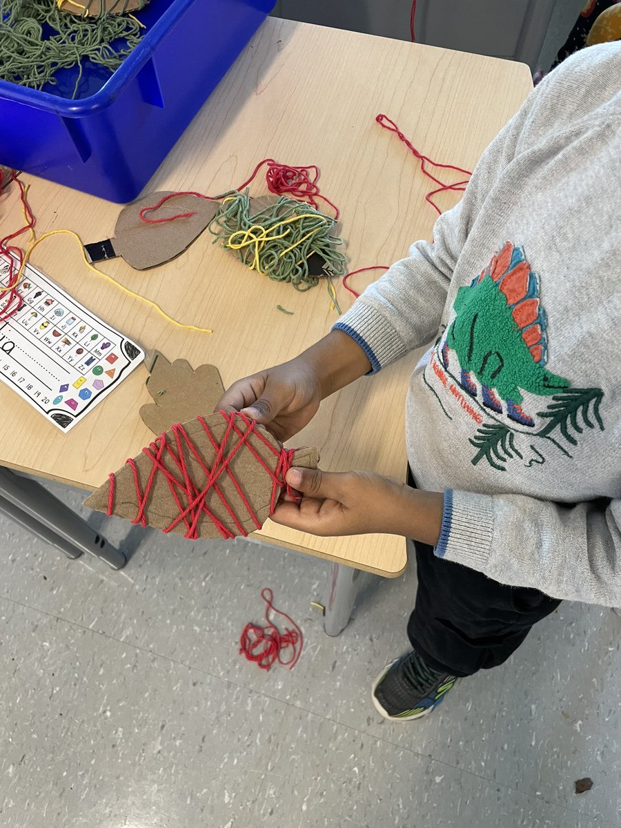 mrsbowesteaches's tweet photo. One free exploration center had students working on their fine motor skills. Students picked a cardboard leaf and practiced wrapping it with coloured yarn. Look at our focus! #perserverance #finemotor #leafweek #art https://t.co/oKIzJHw6OK