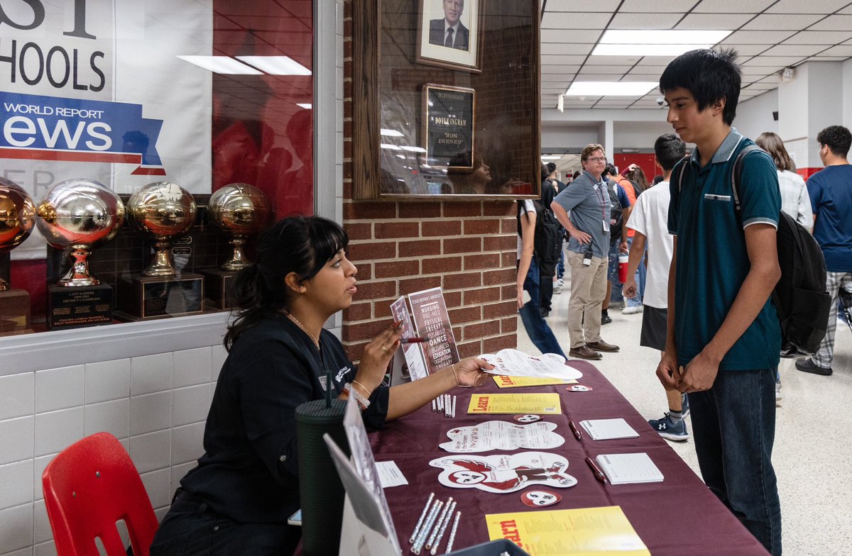 Today, Ryan High students got to visit with @UNTsocial, @twuniversity, @nctclions, and other local colleges and ask all of the questions (and get some candy). 65% of Ryan High graduates attend local colleges after graduation so this info helps many to understand their options.