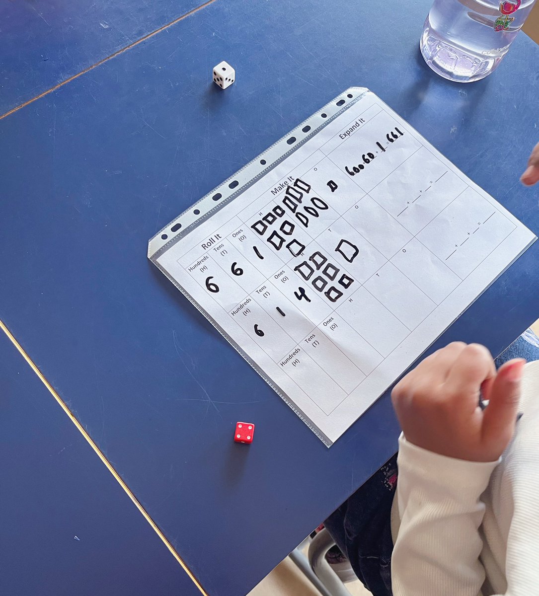 Let’s roll a number! We practiced place value and number representation this week. #BelPark #Math #PlaceValue