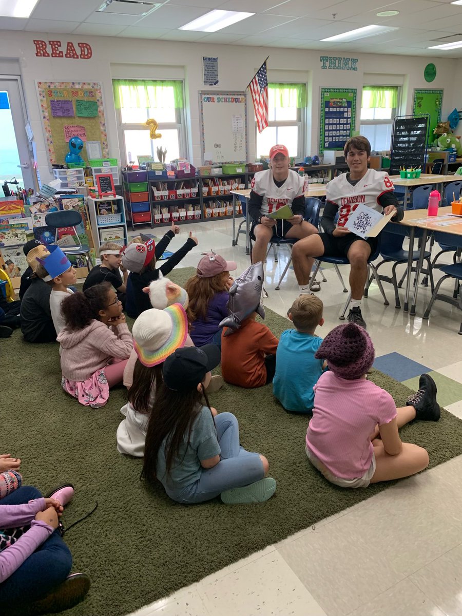 Second graders were so excited to read with @DUFootball players today! Thank you to @ACTC_NCS for starting the conversations about college in elementary!