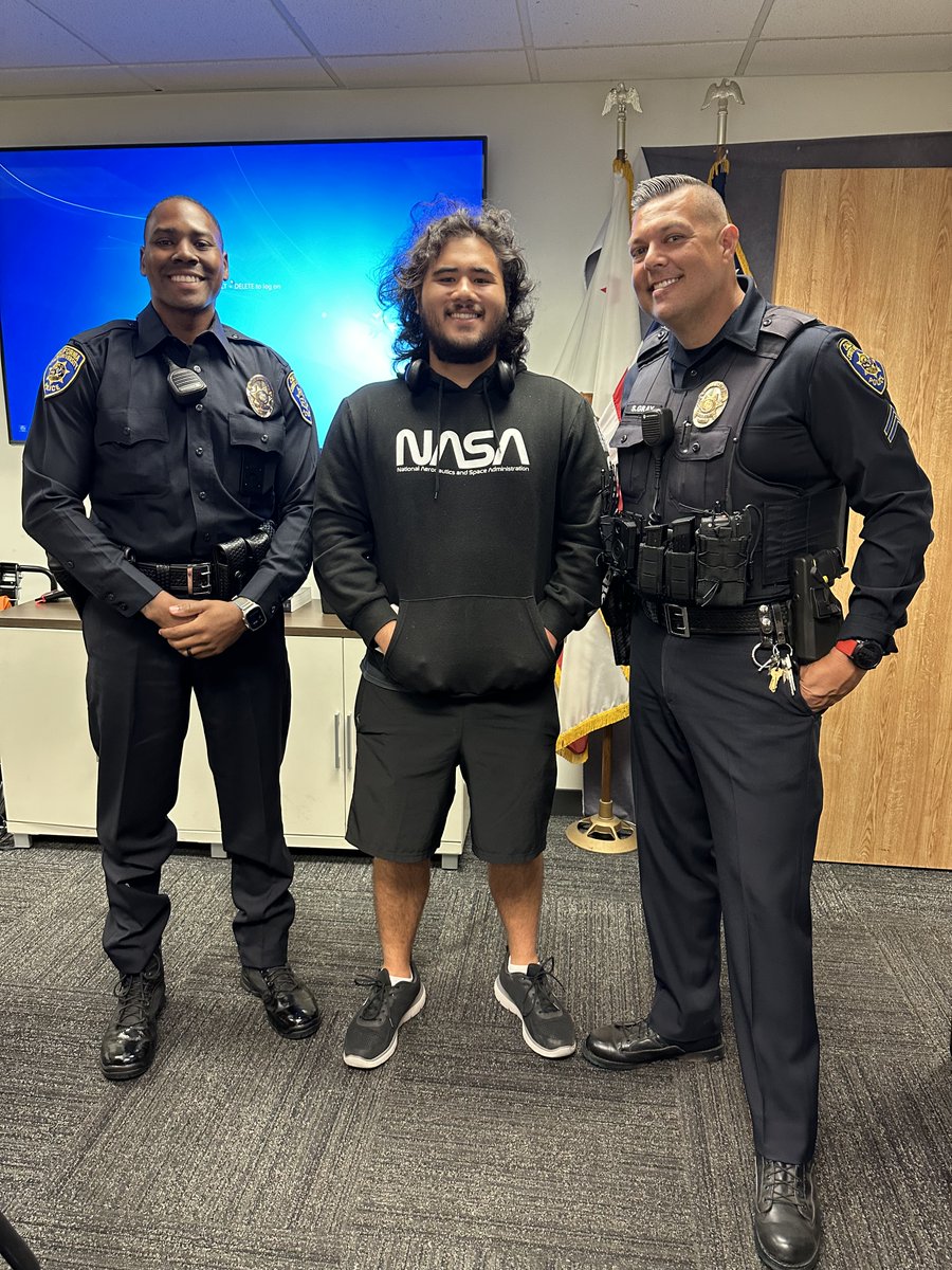 CSULBPolice's tweet photo. A student stopped by the station to learn more about UPD and had the opportunity to interview Cpl. Gray and Ofc. James for their journalism course. UPD is always open to collaborate with students and campus organizations! https://t.co/ntIxjk1vZm