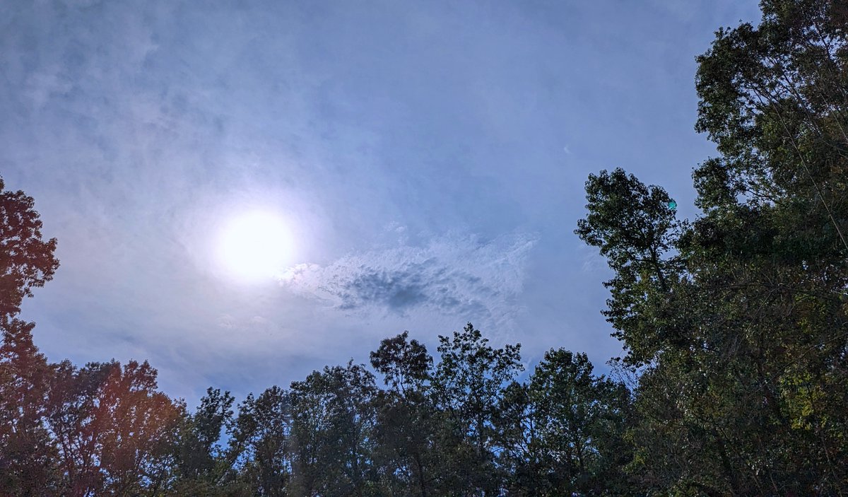 catjkuhn's tweet photo. The sun peeking out from behind an interesting patch of clouds (I think cirrocumulus, but please correct me if you know for sure). #Skytember https://t.co/Y19cMmd32Z