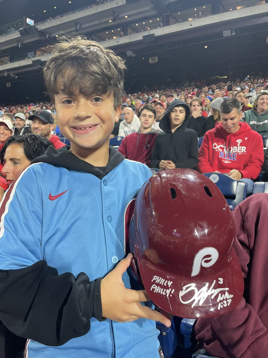 Here is Hayden Dorfman, age 10, who caught the helmet Harper threw after he was ejected tonight. A few security guards approached him and told him Harper wanted to sign it. He said Harper is his favorite player and added that this is “the best baseball game he’s ever been to”
