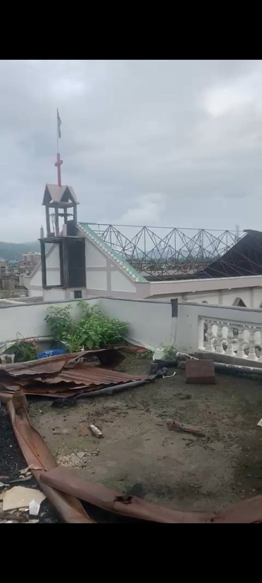 tebawk's tweet photo. They believed that vandalizing Kuki churches wasn't enough, so they opted to raise the Salai Taret Meitei Supremacist Flag above the Church, symbolizing their perceived superiority. The lasting impact of this act by the Meitei community will be remembered for generations to come. https://t.co/1gnHHUrD4e