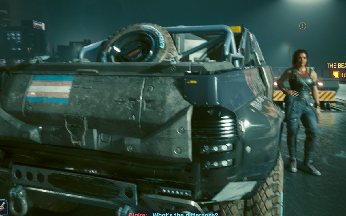 FinalBossFemme's tweet photo. did i miss the whole cyberpunk2077 discourse around the badass racer with the trans flag on her street tank??? https://t.co/wXAk2qbn3Q
